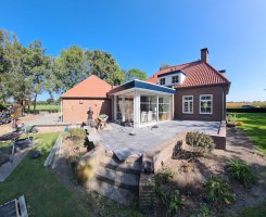 Aanleg achtertuin / bestrating Borkel en Schaft