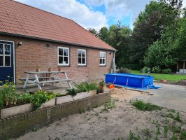 Aanleg achtertuin / bestrating Borkel en Schaft