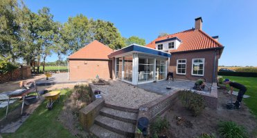 Aanleg achtertuin / bestrating Borkel en Schaft