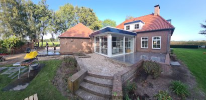 Aanleg achtertuin / bestrating Borkel en Schaft