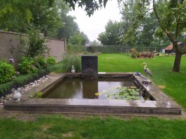 Aanleg bestrating en vijver Bergeijk