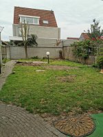 Aanleg natuursteen tegels / gazon Helmond