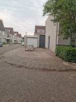 Aanleg natuursteen tegels / gazon Helmond