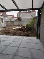 Aanleg natuursteen tegels / gazon Helmond