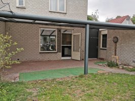 Aanleg natuursteen tegels / gazon Helmond